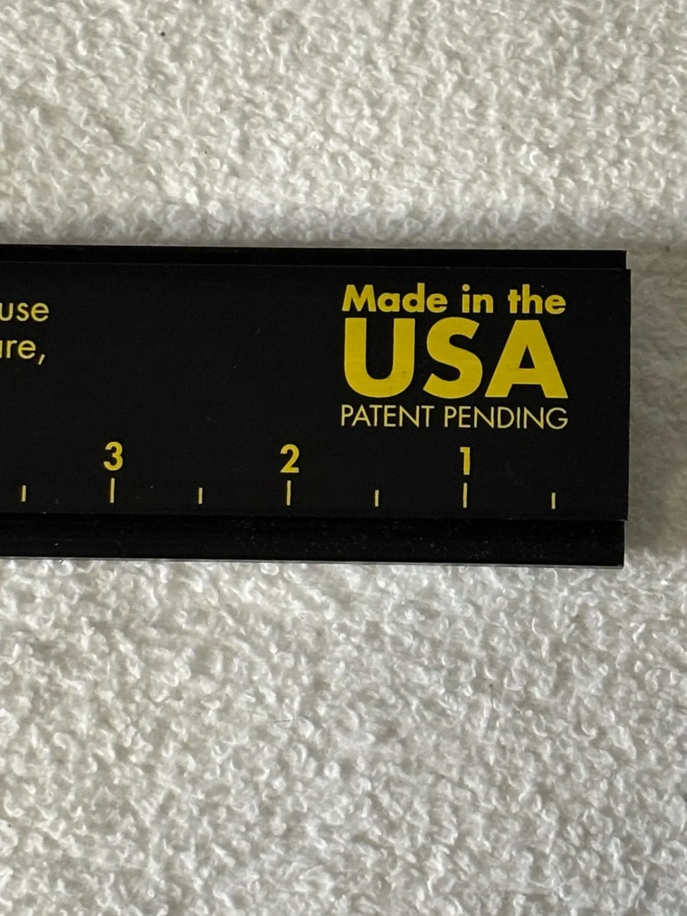 Hang it Perfect Picture Hanger in Black and Yellow